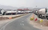 Iranian truck drivers in long queues for diesel