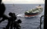 What is the story of the secret passage of invisible oil tankers through the Strait of Hormuz?